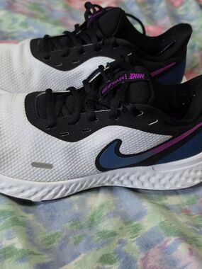 Nike Women's White & Black Running Shoes with Blue Swoosh